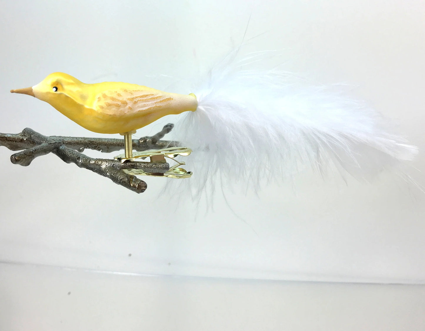 Small Yellow Bird with White Feather Tail Ornament Clip